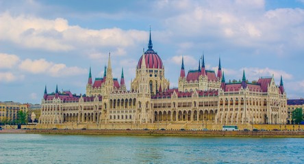 View over building of hungarian parliament in budapest taken from opposite shore of danube river