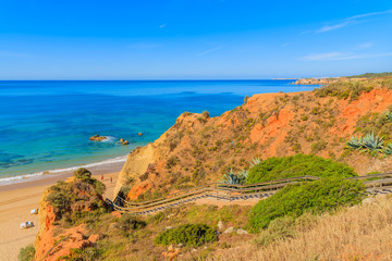 Cliff rocks on beautiful beach near Portimao town, Algarve region, Portugal