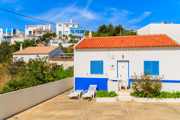Traditional style house in Salema coastal town, Algarve region, Portugal © pkazmierczak