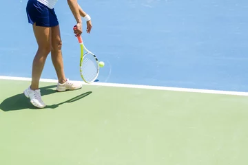 Foto auf Leinwand Beautiful female tennis player serving © NDABCREATIVITY