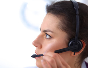 Close-up portrait of a customer service agent sitting at office