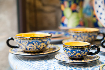 View of a typical pottery decorated coffee cup from Caltagirone with flower decorations