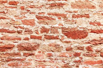 Red medieval brick wall background