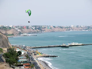 Foto op Canvas Stock Photo - Shot of the Green Coast beach in Lima-Peru © Aroastock