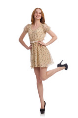 Pretty red hair girl in summer dress isolated on white