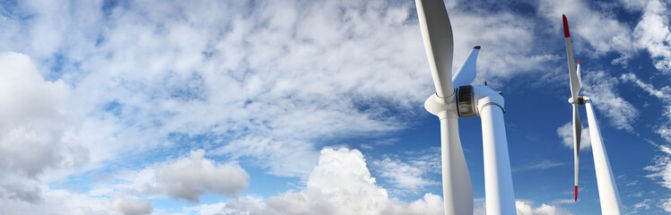 energy wind turbines on blue sky with clouds