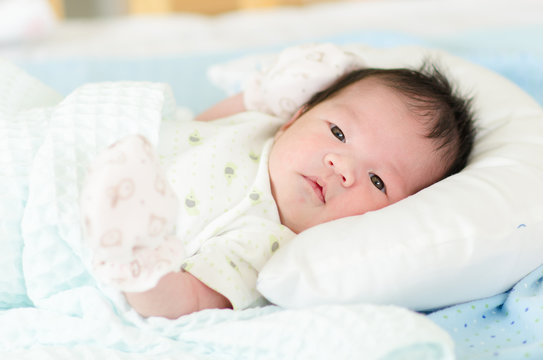 Portrait Of Cute Asian Baby