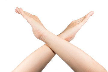 makes an X shape with his arms and hands. This could mean stop, cross, or 