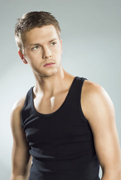 Handsome Young Man In Black Tank Top