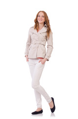 Cute smiling girl in light short coat isolated on white