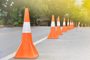 Traffic cones placed on the asphalt event.