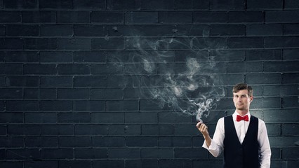 Businessman and pipe smoke