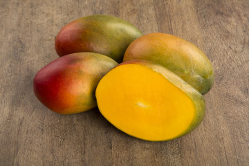 Fototapeta na wymiar mango on a wood background.