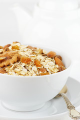 Oatmeal flakes with nuts in bowl