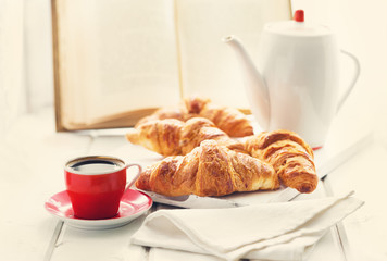breakfast with croissants and coffee