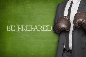 Be prepared on blackboard with businessman 