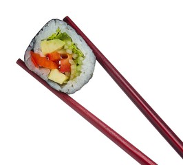 Sushi roll in chopsticks isolated on white background