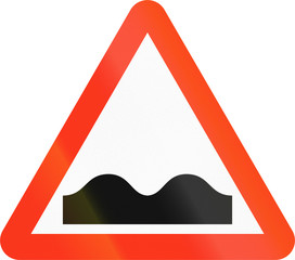 Bangladeshi sign indicating speed bumps or uneven road