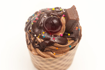 Chocolate cream cake with red jelly