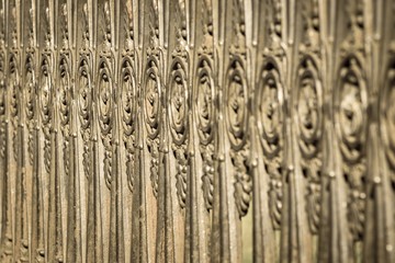ancient fencing from old steel of bronze color