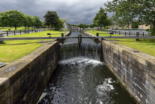 small canal navigable, river barges to runoff, Scotland