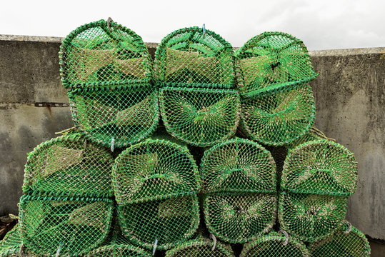 Fototapeta Close up of many lobster cages with a vintage process.