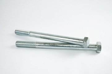 New metal bolt separated on white background