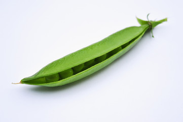  		
the young pod of green peas on a white background