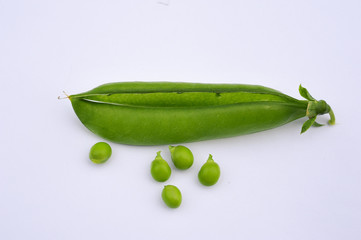  		
the young pod of green peas on a white background