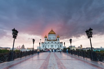 Sunset over Cathedral of Christ the Saviuor in stormy weather, Moscow, Russia.