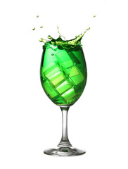 Green water spread in a wine glass isolated on white.