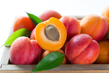 Fototapeta na wymiar Fresh apricots on wooden table, close-up.