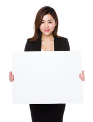 Asain businesswoman show with the blank placard