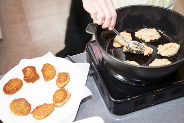 frying vegetarian cutlets from lentil on frying pan