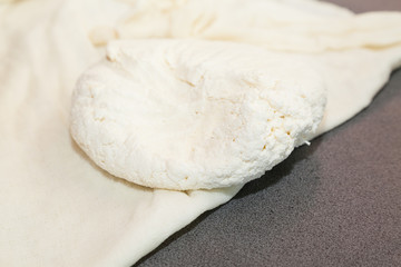 Closeup of whole paneer on buttercloth