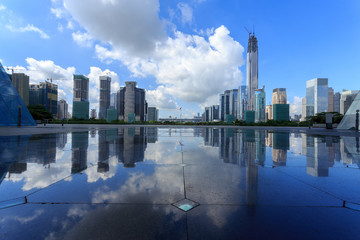 Modern skyline and buildings with empty square floor