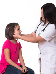 Doctor examining cute girl on white background