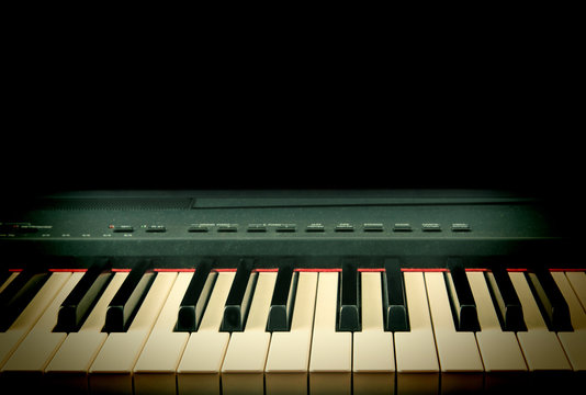 Electric piano keyboards, close-up.