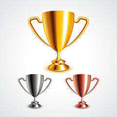 Golden, silver and bronze trophy cups vector set