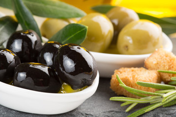 black and green olives, rosemary and croutons