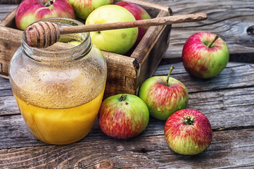 harvest of ripe apples and honey to the Church celebration of the apple feast day
