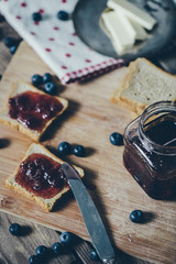 Toast bread with wild strawberry jam. Retro,vintage filter