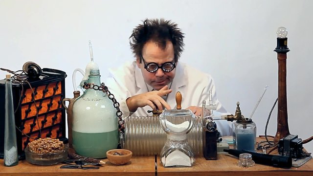 the scientist produces elixir in laboratory