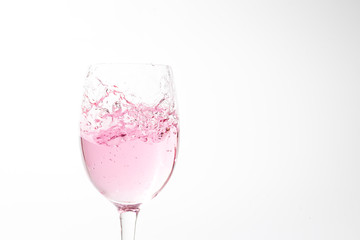 Pink Wine Glass splash Closeup