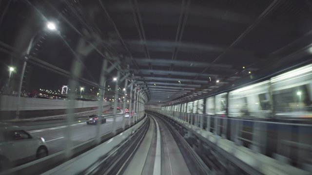 Point of view real-time ride through Tokyo via the automated guideway transit system (AGT) called the Yurikamome. No unwanted window reflections.