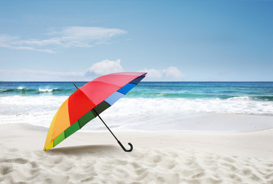 Schirm am Sandstrand