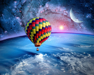 Hot air balloon fairy tale landscape fantasy moon earth sun. Elements of this image furnished by NASA.