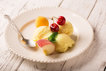 Tasty ice cream with  fruits
