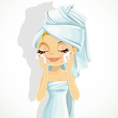 Cute girl washes facial wash isolated on a white background