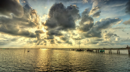 Ham Ninh, Phu Quoc jetty in the early morning sun with cloudy down the projector beam, apparently...